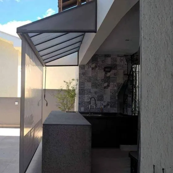 Reforma de Toldos e Coberturas em Centro, Porto Ferreira SP — Instalação em fachada comercial